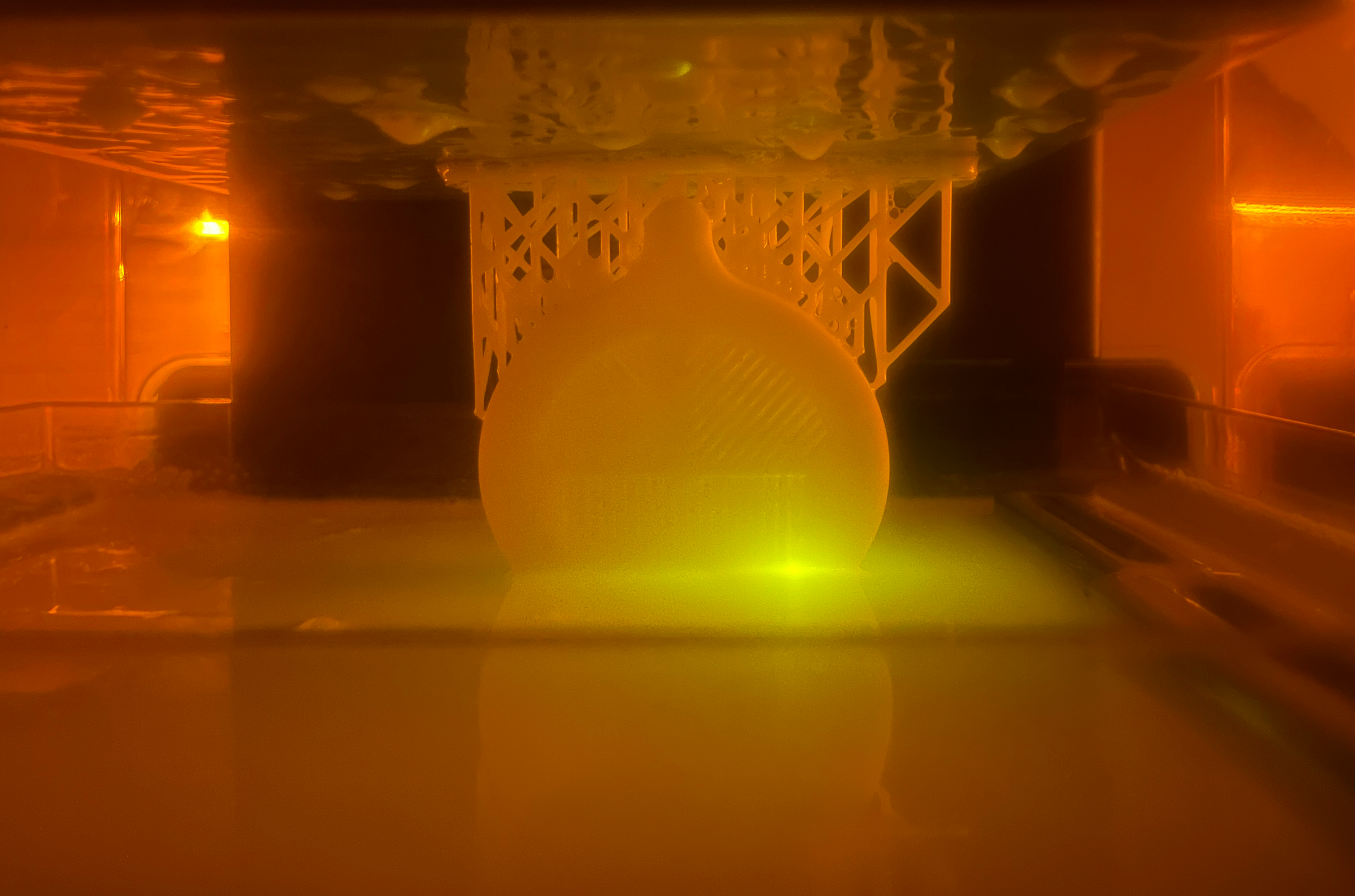 3D RESIN PRINTER WITH PART ON BED